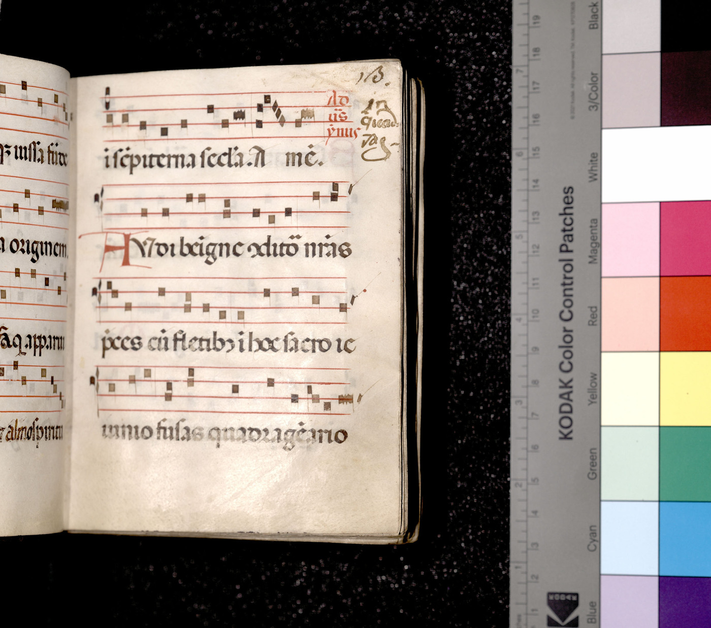 A right page of the Noted Hymnal beside the Kodak Color Control Patches.