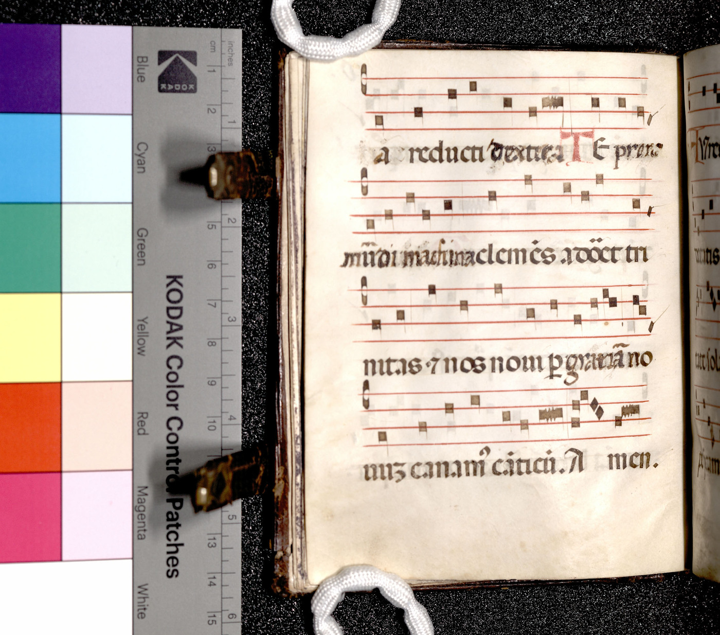 A left page of the Noted Hymnal beside the Kodak Color Control Patches.