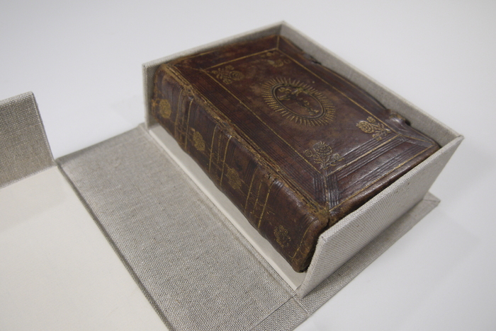 The Noted Hymnal is sitting in a custom box created by Jennifer Robertson.