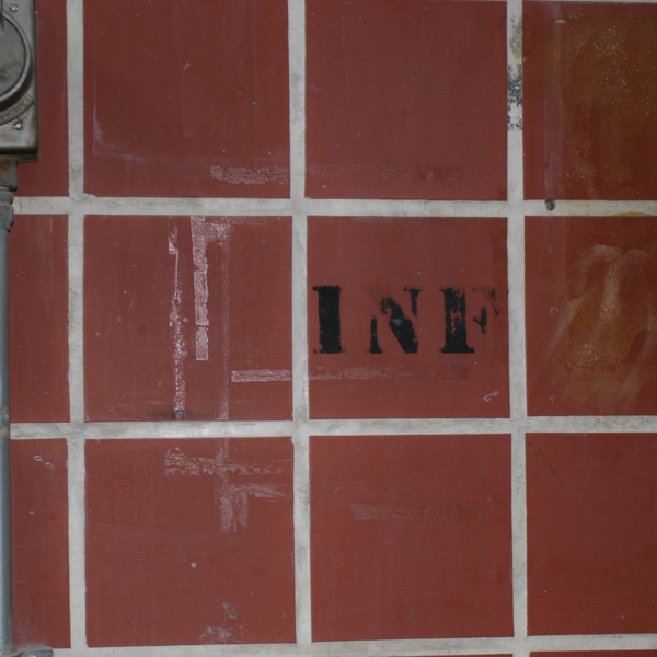 Stencilled Lettering on Quarry Tiled Wall 1