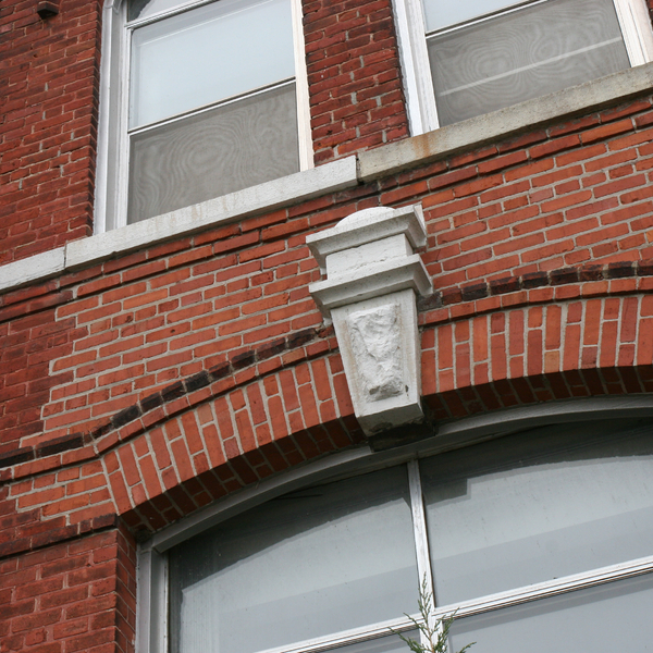 Window with Cornice on Red Brick Building 2